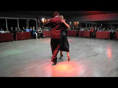  John Erban  and  Clarissa Sanchez  are  dancing  to  a  tango