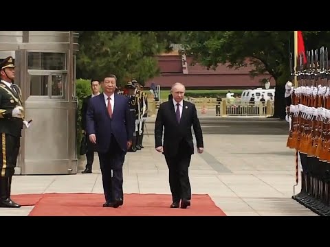 Vladimir Putin meets Xi Jinping in China