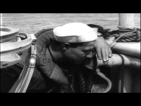 Gun mounted on US troop transport fires after U boat alarm rings, during World Wa...HD Stock Footage