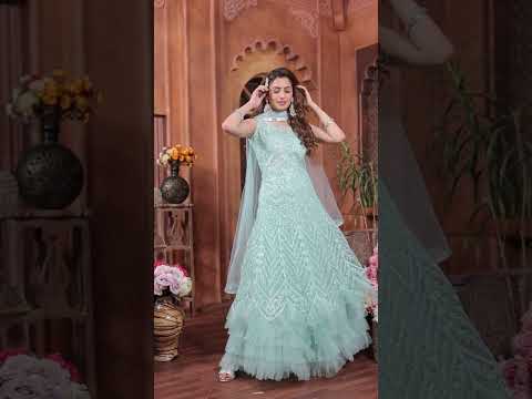 Embroidered ladies light green net gowns, sleeveless