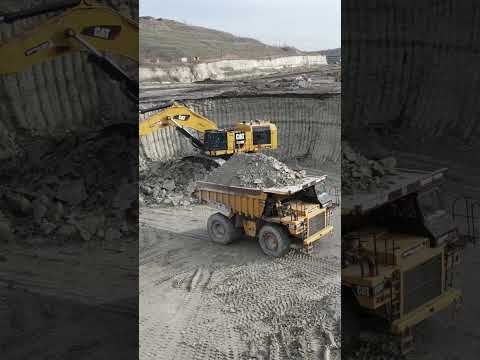 Aerial View Of Caterpillar 6015B Excavator Loading Cat Dumpers - #shorts