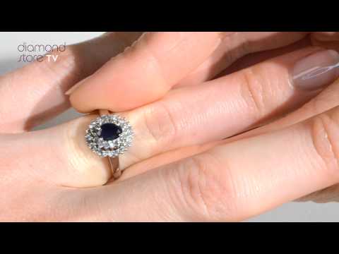 E5797 - 0.65ct Sapphire And Diamond Ring