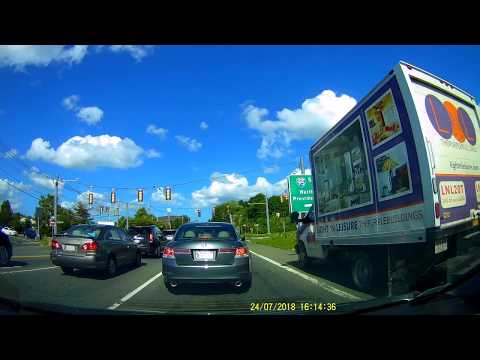 Truck drives over sidewalk to beat traffic - Mishawum RD Woburn MA