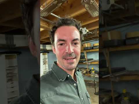 Marc and Joel Savoy at work constructing the accordion