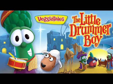 VeggieTales poster for 'The Little Drummer Boy' showing a green veggie drummer, a white-sheep character, camels, and other colorful VeggieTales figures.