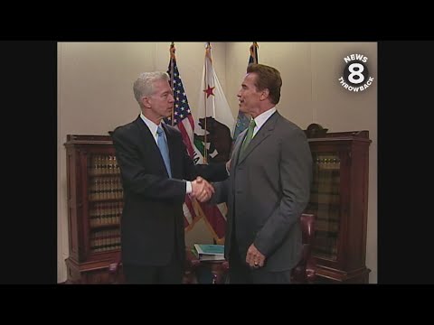 Governors Gray Davis and Arnold Schwarzenegger after recall election 2003