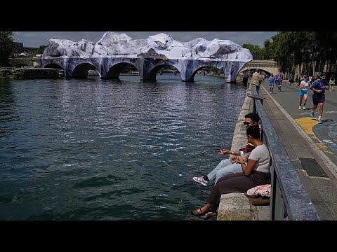Video Thumbnail: Crowds flock to JR's giant cave installation on Paris' Pont Neuf