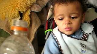 kid jake has cheerios after his milk (15 mo - nov 16 08)