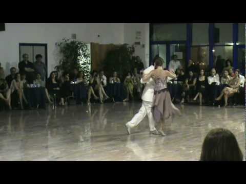  Andrea Misse  and  Javier Rodriguez  are  dancing  to  a  tango