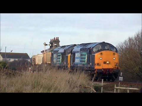 DRS Class 37s 37603 + 37667 at Valley, Anglesey, on nuclear flasks, 20-11-2014.