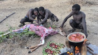 Hadza morn hunting and cooking their lunch