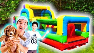 Puppy’s First GIANT BOUNCE HOUSE!