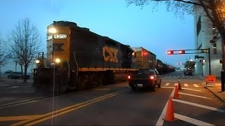 CSX Street Runner Train Shares The Road In The City With Cars