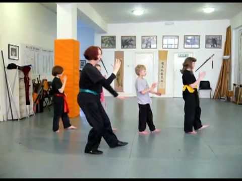 Tai Chi beginning performed by kids' class
