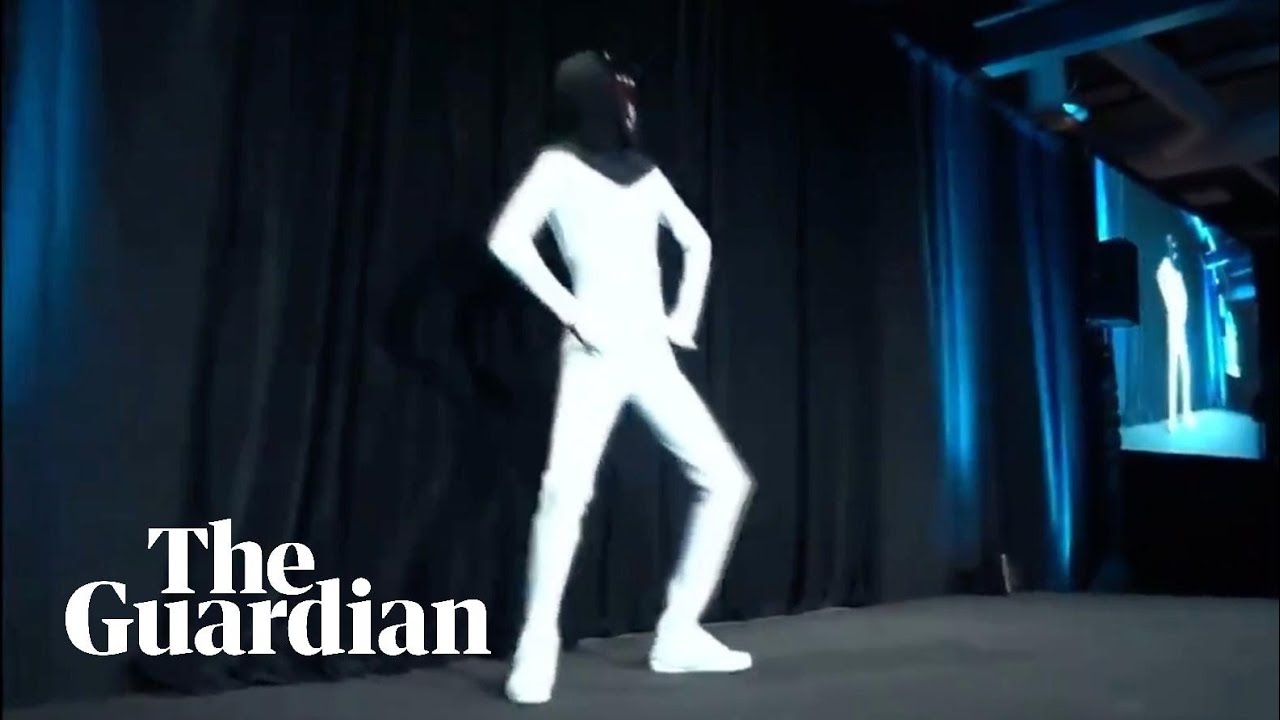 Elon Musk unveils plan for 'Tesla Bot' with man dancing in a bodysuit - YouTube