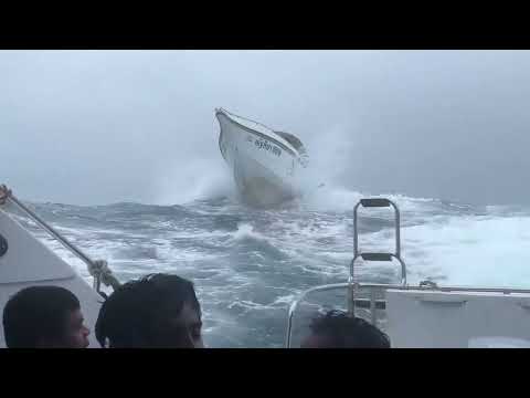 Passengers scream as speedboats bounce over huge waves