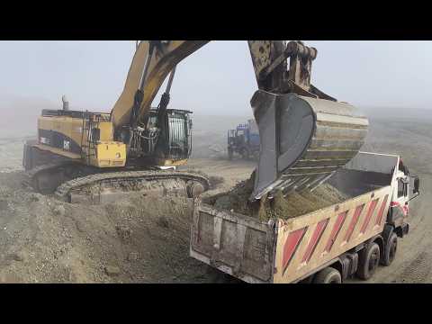 Caterpillar 385C Excavator Working On A Hard Rock Materials & Loading Trucks - Interkat SA