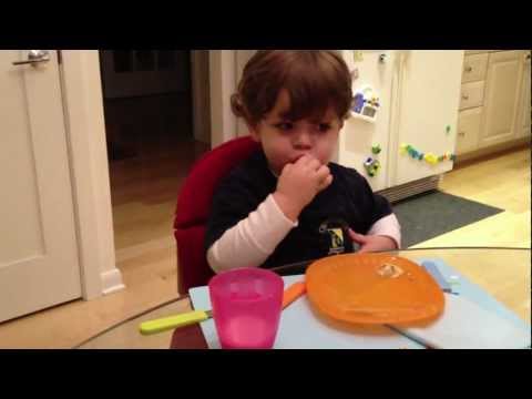 Pipa and Ben eating dinner. Hot dog and Mustard: 'Yummy in my tummy'.