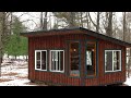 building a cozy off grid cabin in the woods start to finish