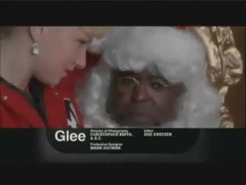 Official FOX promo frame for Glee Season 2 Christmas episode 'A Very Glee Christmas' with festive title card