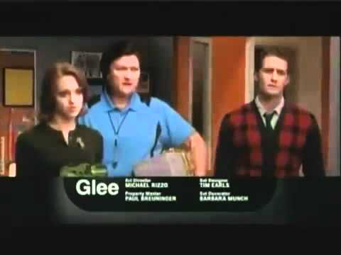 Promo shot showing Glee’s McKinley choir room with Christmas decorations mid-chaos