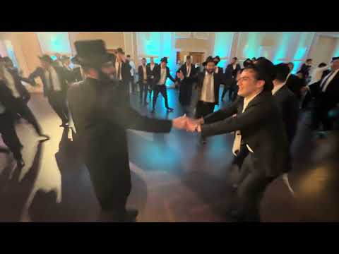 Chesky Schwartz on keys & Chaim brown singer second dance