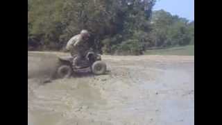 preview picture of video 'Big Rock, KY -Eric riding his his raptor through the Mud hole. quad'