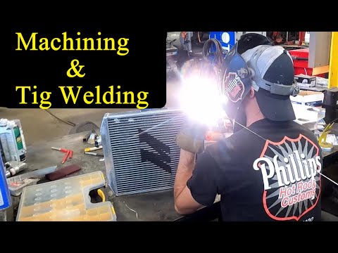 Machining and Tig Welding Aluminum AN fitting to a Radiator. Machining on a lathe