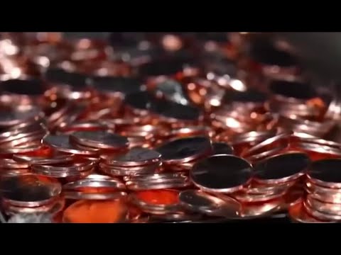 U.S. Mint in Philadelphia presses last-ever penny