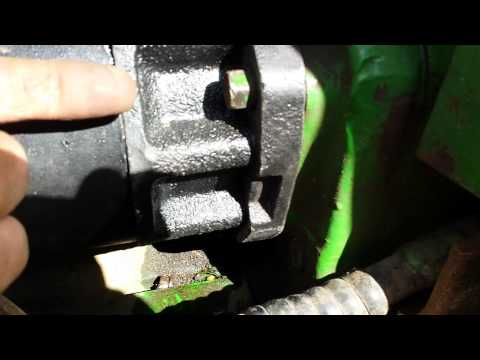 Replacing a John Deere 4450 starter nut problem.
