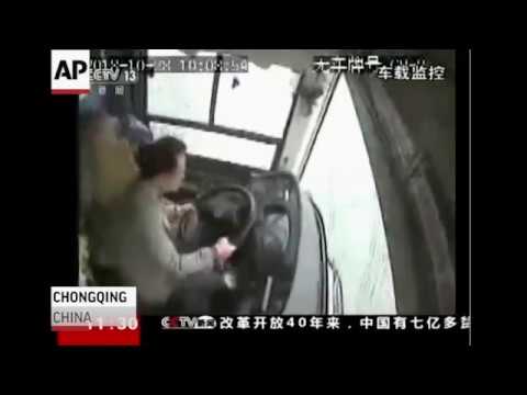 Police say a brawl between a passenger and a bus driver was the cause of the bus plunging off a bridge and into a river in southwestern China. At least 13 people died in the crash. (Nov. 1)