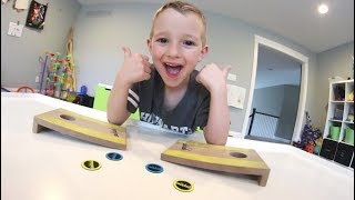 FATHER SON MINI CORN HOLE TRICK SHOT!? / Coinhole!