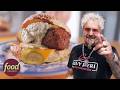 Guy Fieri Tries The Nashville Hot Chicken Bun Diners Drive Ins And Dives