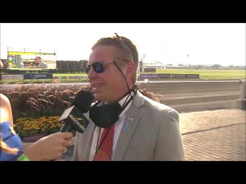 Jessica Otten with Jason Settlemoir drawing the winner for the $10K Employee Raffle