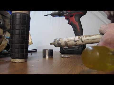 Assembly of a 1970's Johnson Evinrude outboard tiller handle