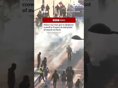 Police use tear gas to disperse crowd in France at end point of march in Paris. #France #BBCNews