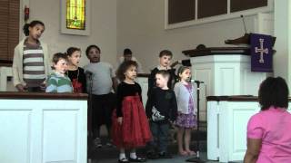 Josie and Darcy sing at church