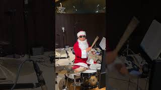 My 78 year old father playing All I want for Christmas if You with drums.  yey!