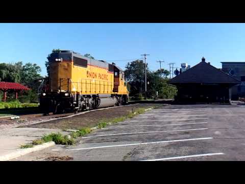 UP 710 Rolling past Ex CNW station