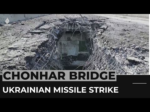 Russian officials say Ukraine missiles damage bridge to Crimea