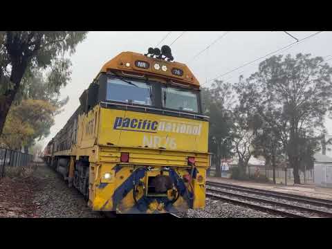 Pacific National intermodal: 5PM5 with NR76 & NR61 building up speed at Dudley Park