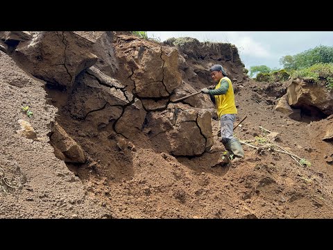 Dropping large rocks buried in the ground