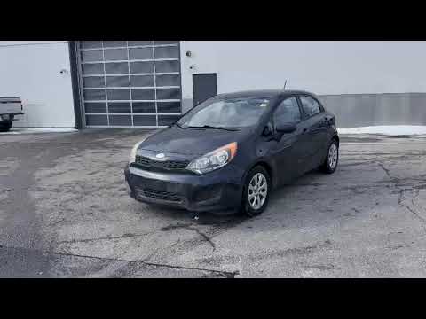 2014 Kia Rio 5dr HB Auto LX in Black for sale at Pine Tree Ford in Woodbridge, ON