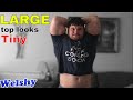 Bodybuilder turns large top into crop top from mass