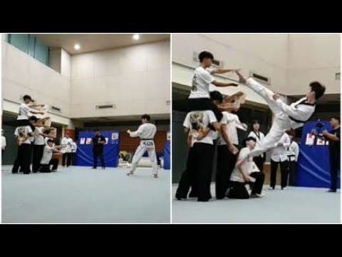 Man breaks 4 WOODEN BOARDS with Spinning Kick!