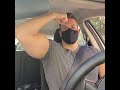 Flexing the biceps in the car