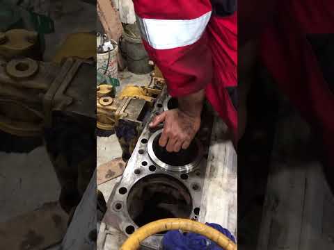 CAT engine cylinder liner installation