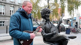 The Auld Triangle (The Dubliners) by the Iconic Luke Kelly Statue by Robin Hey on the Mandolin. 