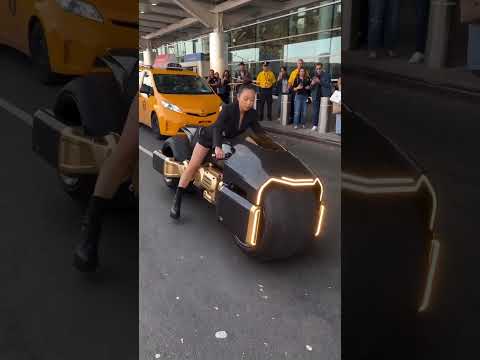 Piano-Black Luxury Suitcase Transforms Into Cyber Super-Sport Bike at JFK 😱🏍️