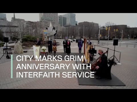 City marks grim anniversary with interfaith service